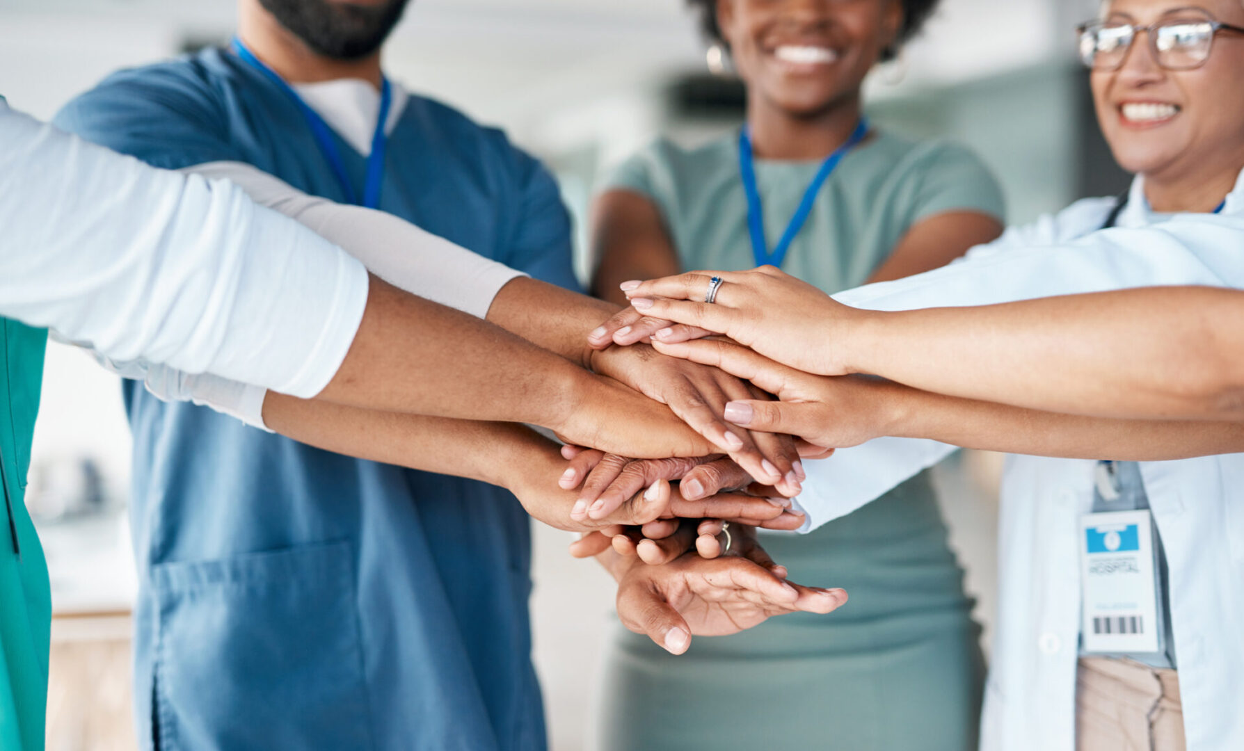 A group of people that are holding hands.