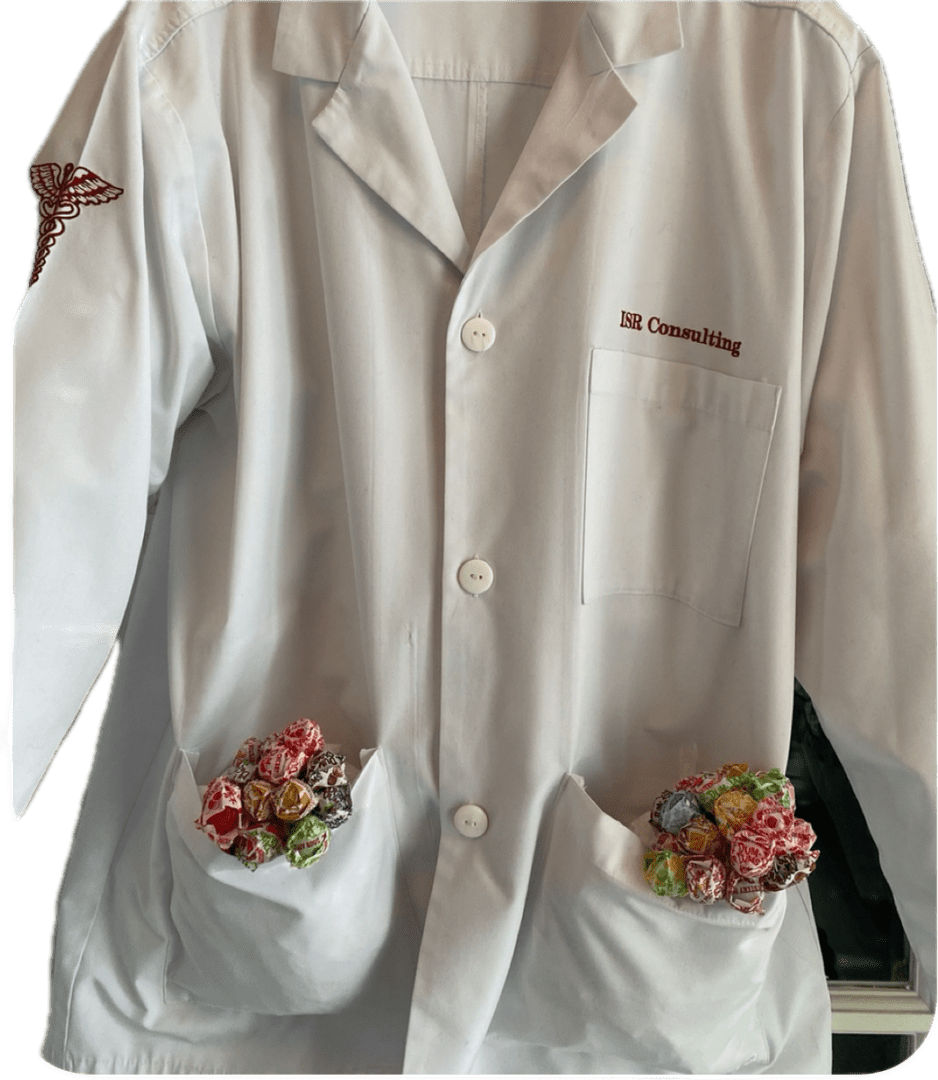 A white lab coat with flowers on the pockets.