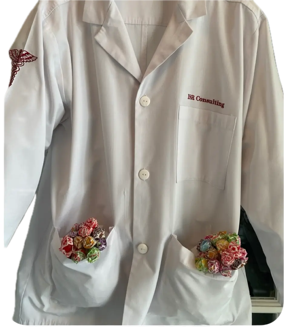 A white lab coat with flowers on the pockets.