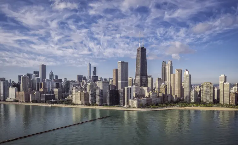 Chicago skyline promoting workplace vaccines for healthier professional environments.